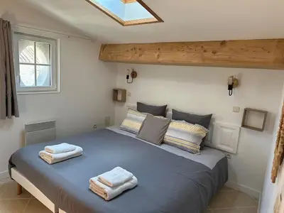 Un ou plusieurs lits dans un hébergement de l'établissement Gîte Chez Tiramisù avec piscine
