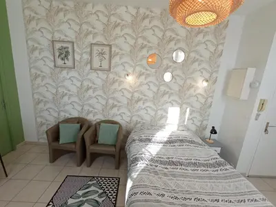 Un ou plusieurs lits dans un hébergement de l'établissement Lumineux appartement en RDC près port de plaisance
