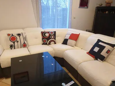 Coin salon dans l'établissement maison piscine